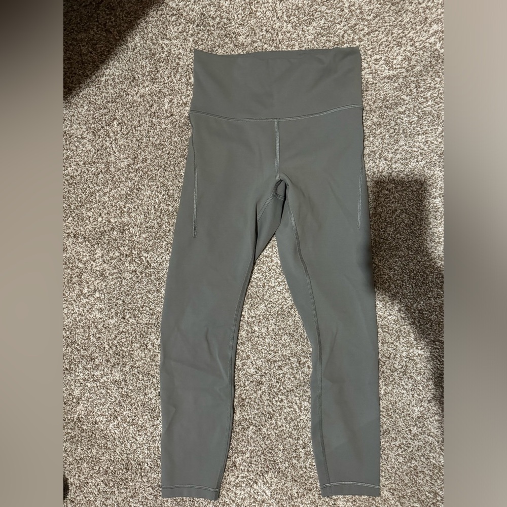 Lululemon Wunder Train High Rise with Pockets 25”. Carob Brown. Size 8. Like New